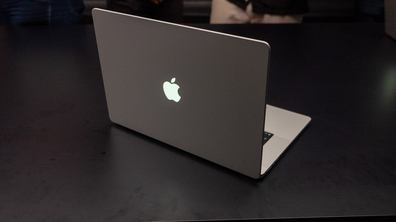 The lid of Apple's new MacBook Pro with its glowing Apple logo.
