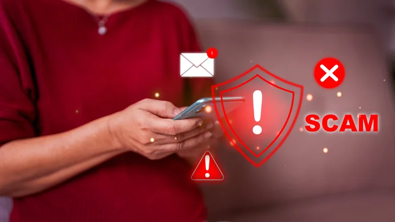 A person checking their smartphone phone with "scam" text and warning signs overlaid.