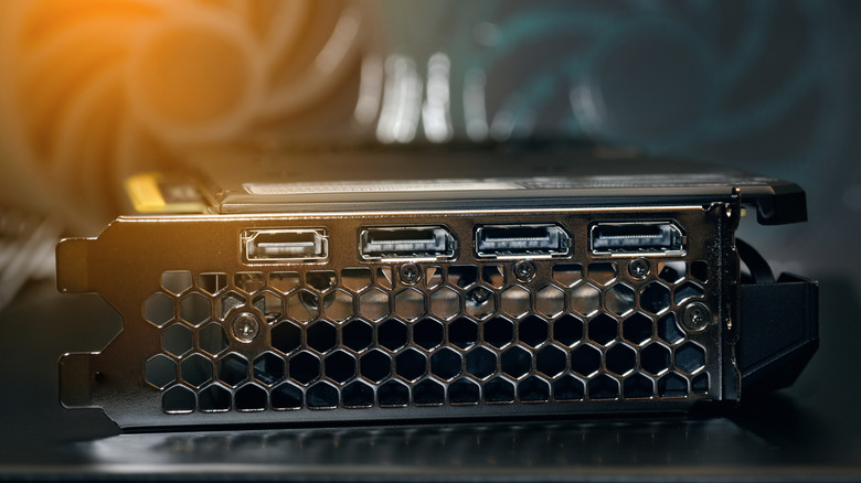 Rear of a graphics card showing one HDMI port and several DisplayPort connections above the cooling vent.