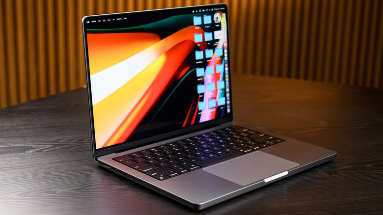 MacBook Pro with an M2, open on a desk.