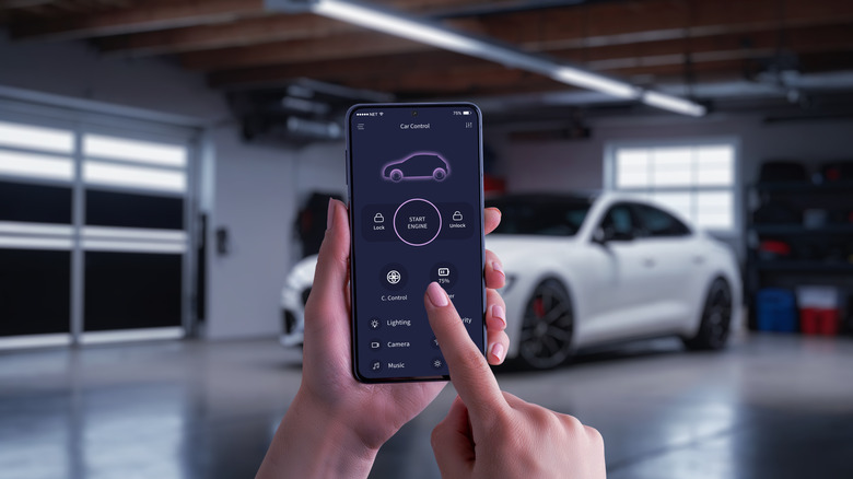 Person starting a car remotely via a phone app