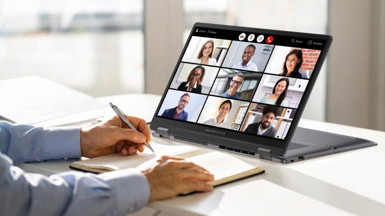 Person shown using new ASUS 360 B5 Flip G2 laptop with screen flipped 300 degrees