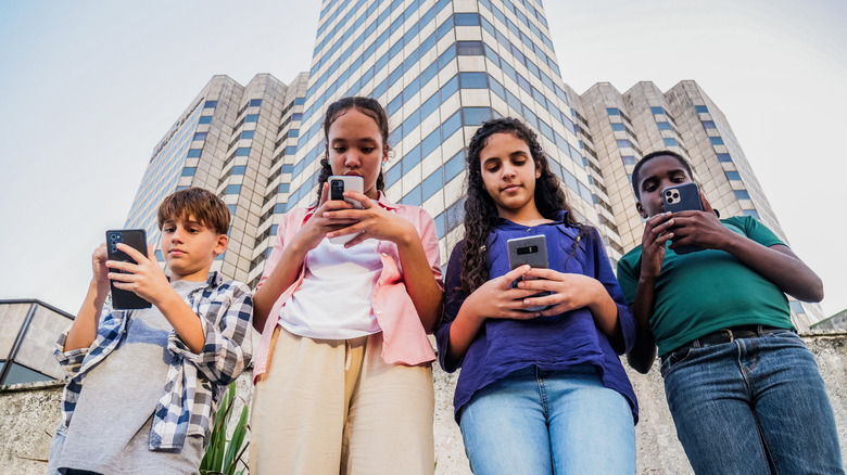 Young people using their phone