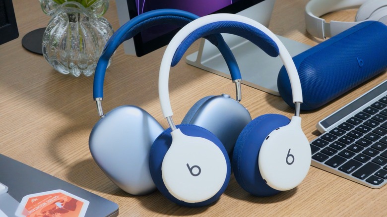 AirPods Max and Beats 360 right next to each other.