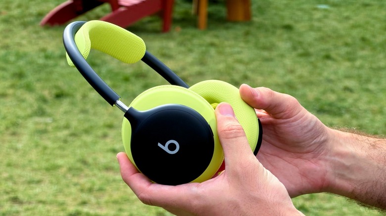 Beats 360 headphones in black and green.