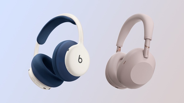 Beats 360 headphones in blue and white next to the pink Sony WH-1000XM6.