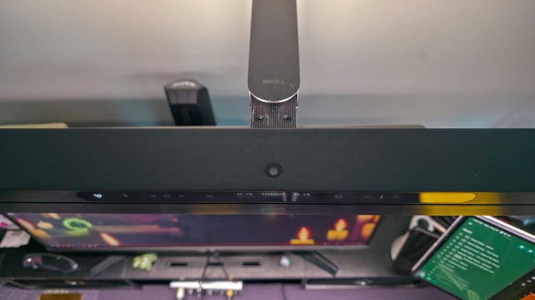 Top-down view of BenQ ScreenBar Max installed on desk