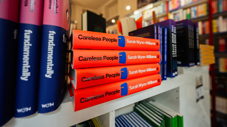 Copies of 'Careless People' on a bookstore shelf.