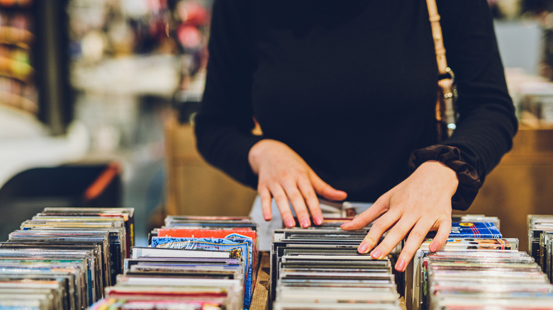 Woman shopping for CDs