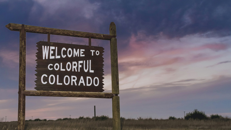 A wooden sign: 