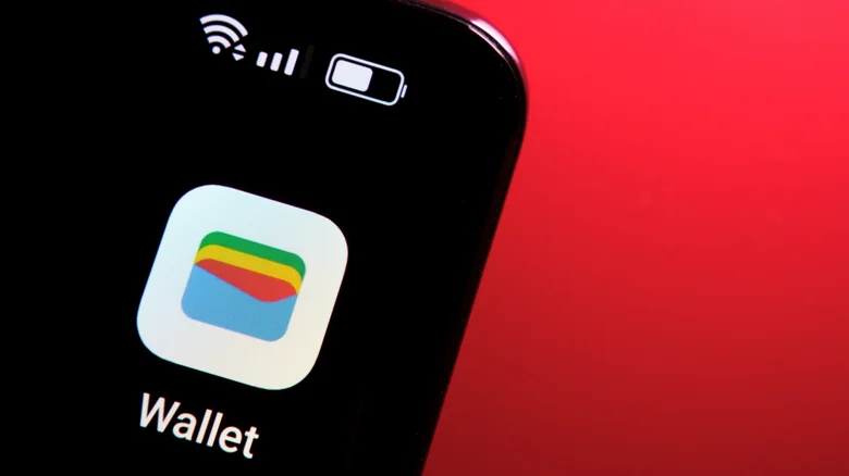 The Google Wallet app logo, displayed up close on an Android phone.