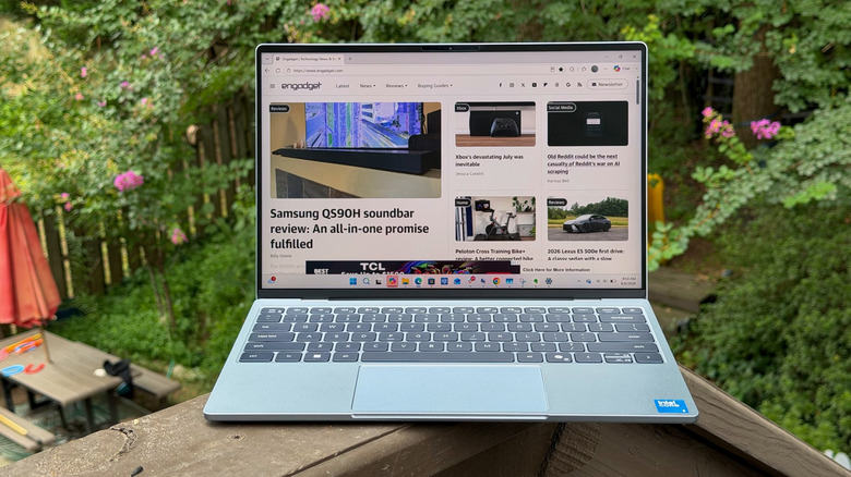 The Dell XPS 13 (2026) on a backyard deck.