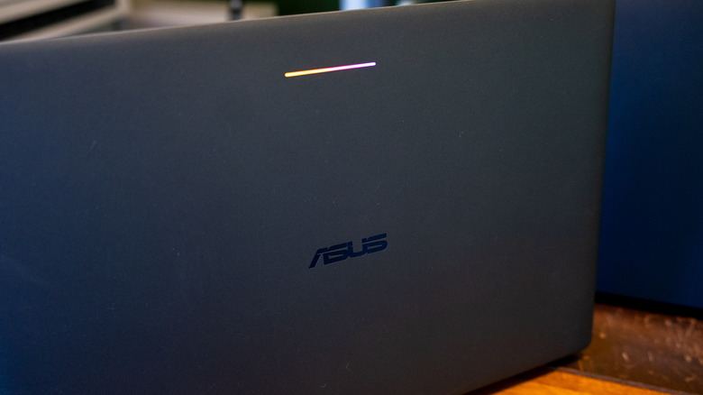 The lid of a Googlebook with its glowbar lit up.