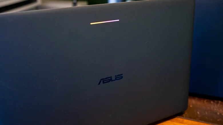The lid of a Googlebook with its glowbar lit up.