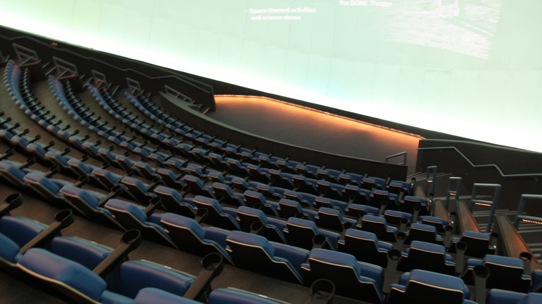 Empty theater seats in an IMAX-style movie theater