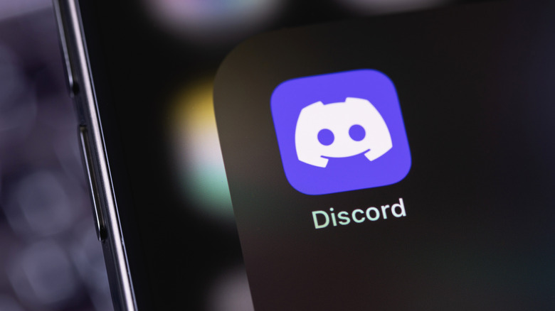 A closeup of the Discord icon, as seen in an iPhone folder.