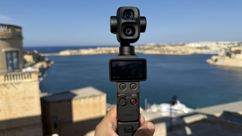 DJI's Osmo Pocket 4P dual-lens gimbal camera is shown in black