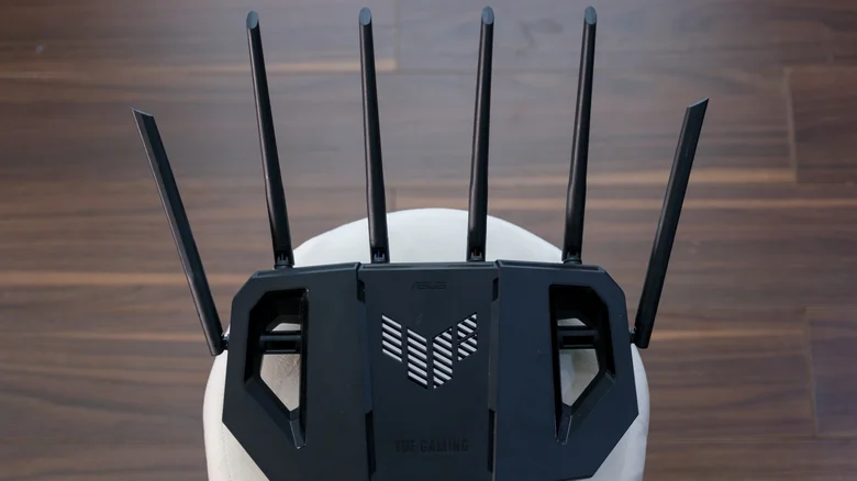 An ASUS TUF gaming router, with six antennae.