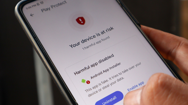 The Google Play Protect menu on an Android smartphone, warning of an installed harmful app.
