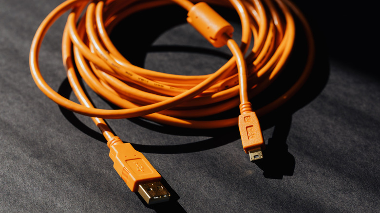 An orange USB cable.