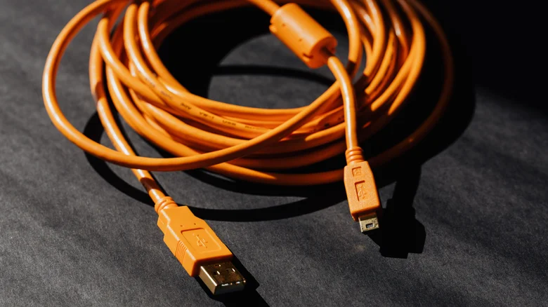 An orange USB cable.