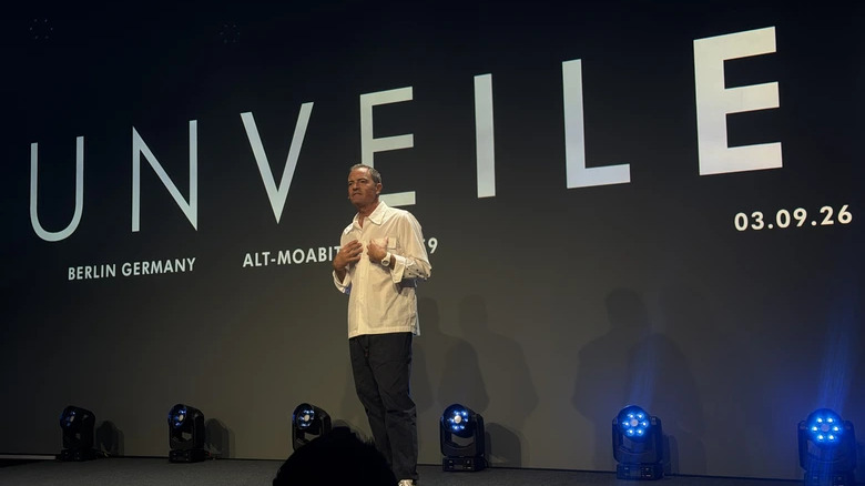 Dyson chief engineer Jake Dyson standing on a stage in front of the word 