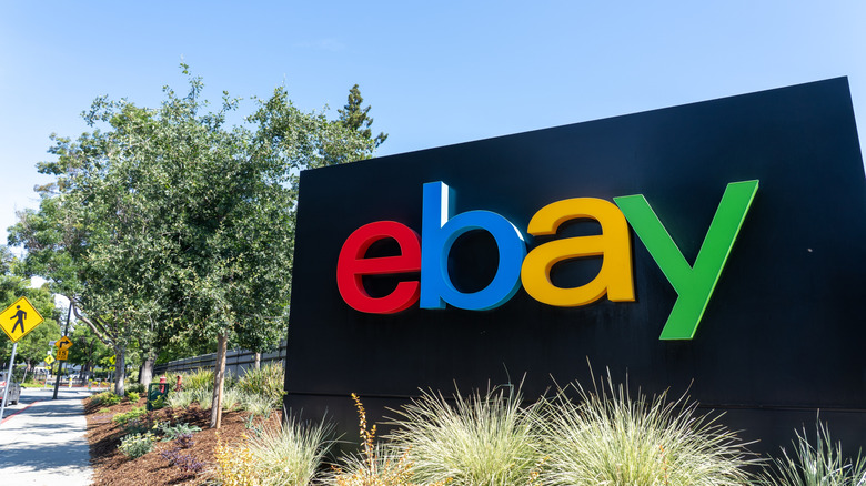 Photo of the eBay logo on a sign outside an office for the company.