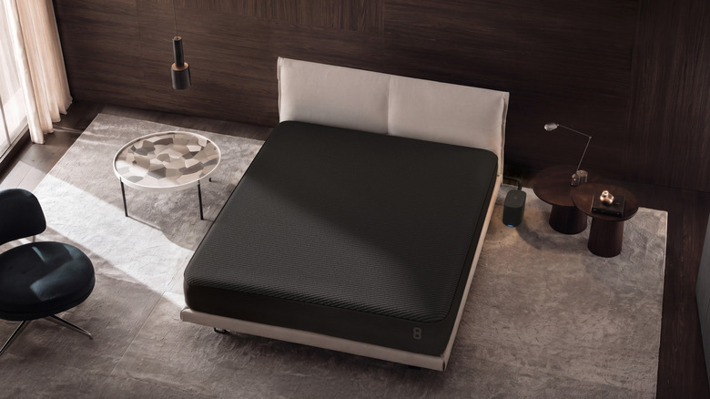 A mattress cover and a hub in a nice room.