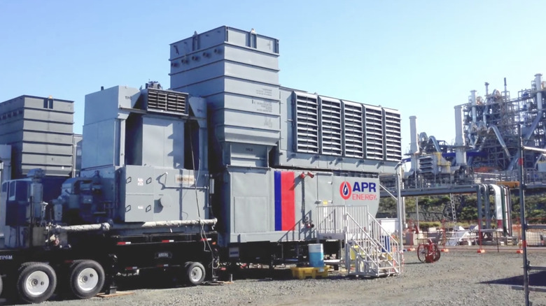 Photo of APR Energy's mobile power fleet at a power plant.
