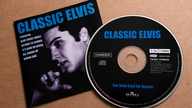 Stock photo shows the 'Classic Elvis' DVD against a brown background