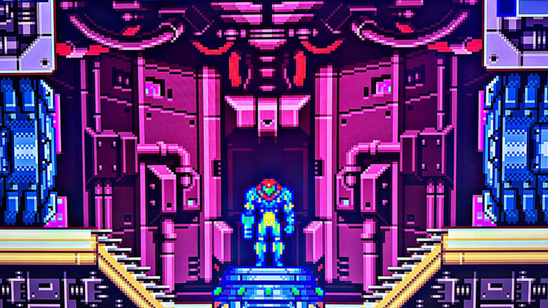 Samus wears her Fusion Suit as she exits from an elevator.