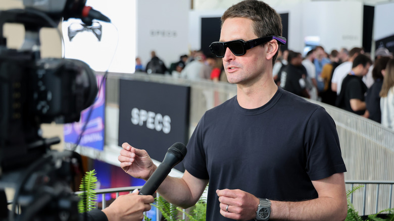 Snap CEO Evan Spiegel wearing the company's new Specs.