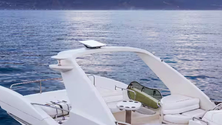 Starlink Performance (Gen 2) mounted on top of a boat anchored in the water.