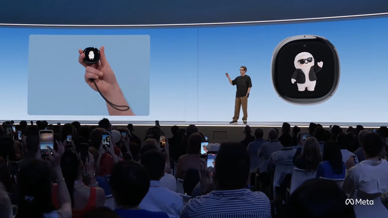 Mark Zuckerberg shows off the Muse Charm on stage at Meta Connect.