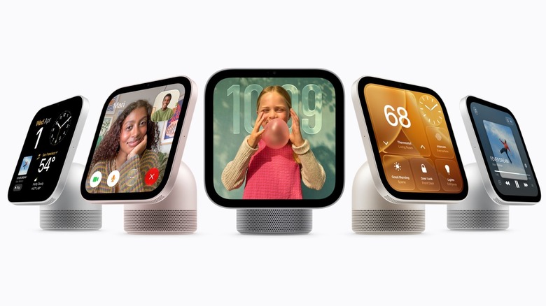 Several versions of a device with a smart display attached to a base in a variety of colors.