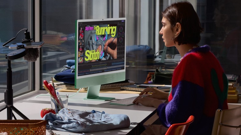 A person using a desktop computer,