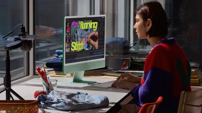 A person using a desktop computer,