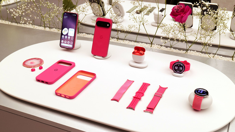 Smartphones, smartwatch, earbuds and accessories in a matching shade of pink.