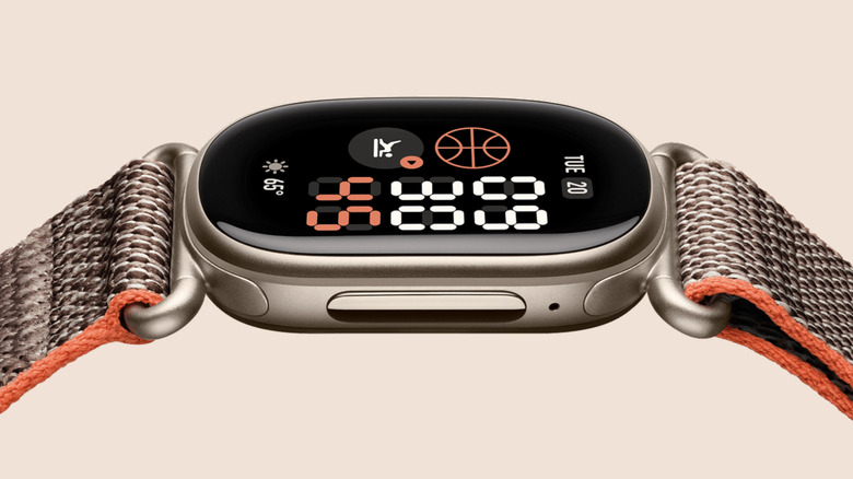 Image of Stephen Curry edition of the Fitbit Edge, with pale gold aluminum case and braided fabric strap.