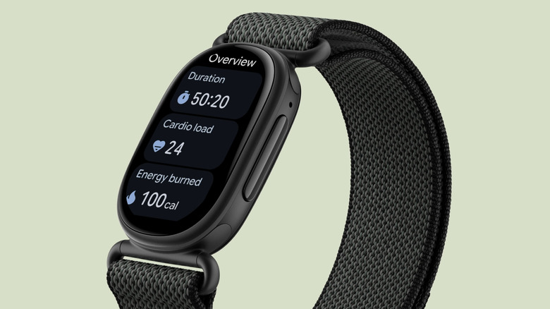 Image of the Fitbit Edge in black with braided fabric band showing workout overview with duration, cardio load and calories burned.
