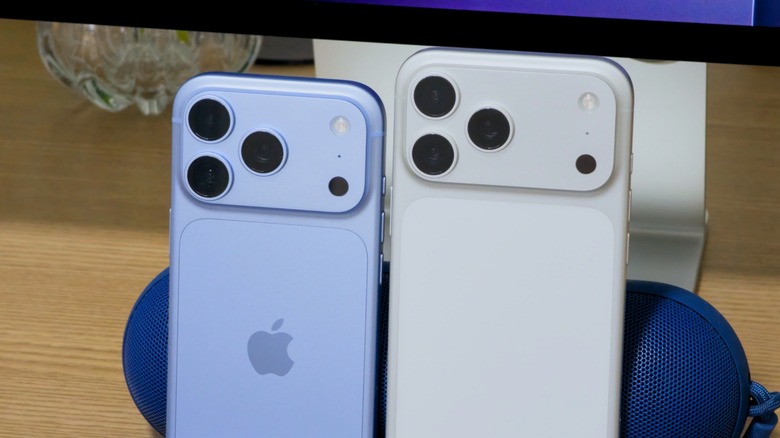 Glacial iPhone 18 Pro next to a silver iPhone 17 Pro Max.