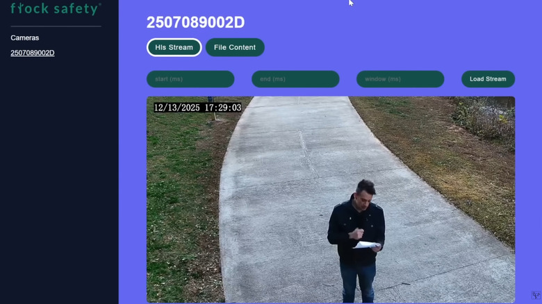 YouTuber Benn Jordan reads a statement from Flock Safety into an exposed Flock Condor camera
