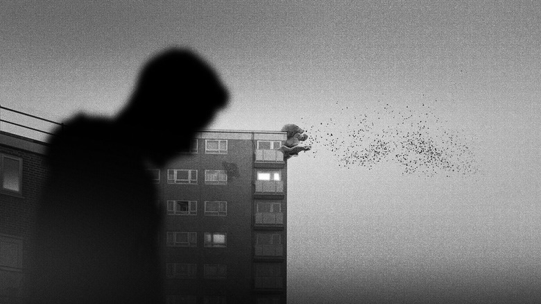 A screenshot from Signet City. As a a silhouetted figure moves in the foreground,