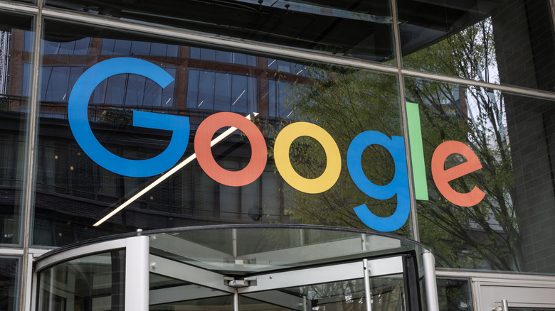 The Google logo shown on the front of a building's glass facade.