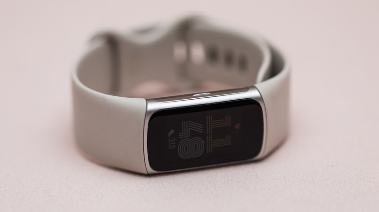 The Fitbit Charge 6 laying on its side.