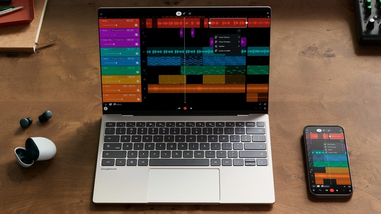 Dell's XPS Googlebook with an Android phone and Pixel Buds.