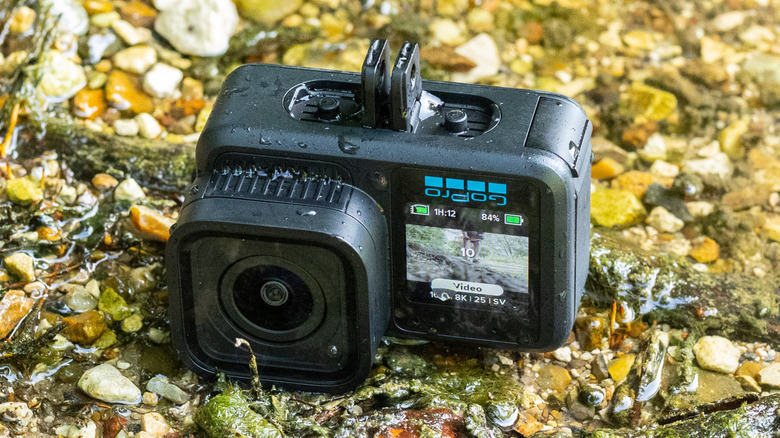 GoPro Mission 1 shown upside down in water to show accessory attachment fingers