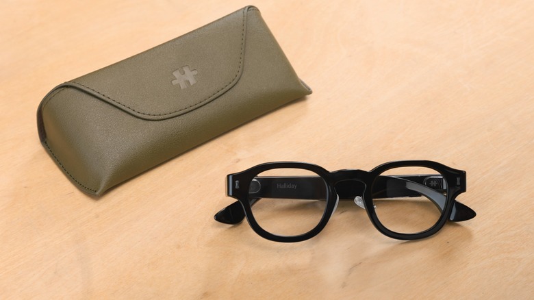 Halliday Glasses and case on a table.