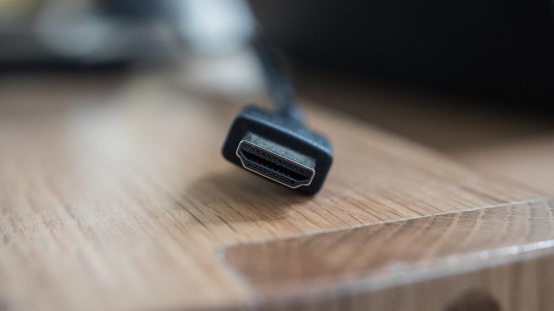 An HDMI cable on a table.