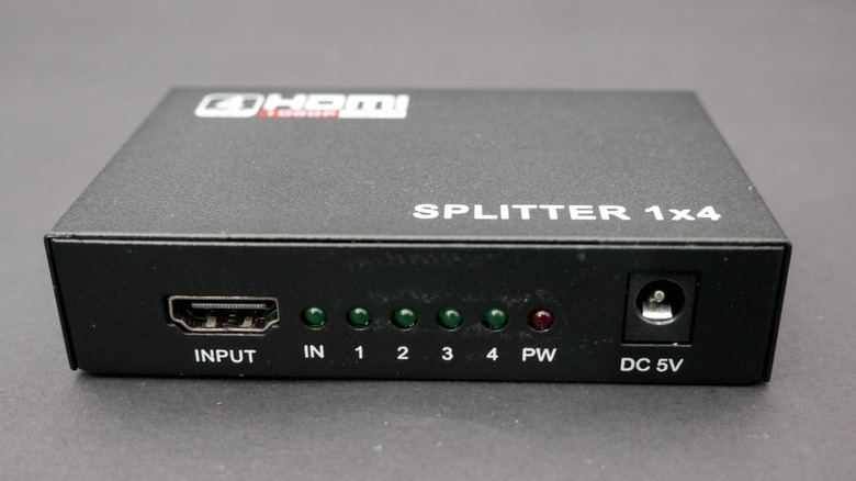An HDMI splitter on a table.